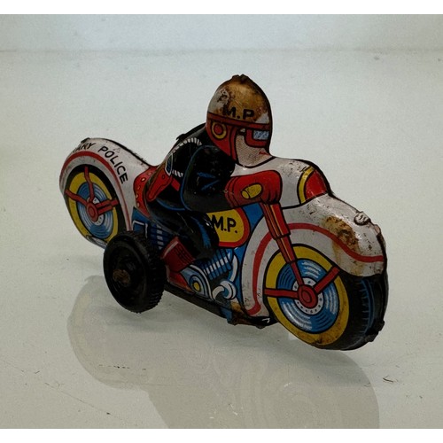 52 - Toys, lithographed tin plate toy Military Police Motorcyclist. 9 cm long.

This lot is available for... 