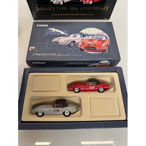 55 - Toys, die cast model cars, boxed, and catalogues, two jaguar E Type car sets and two catalogues.

Th... 