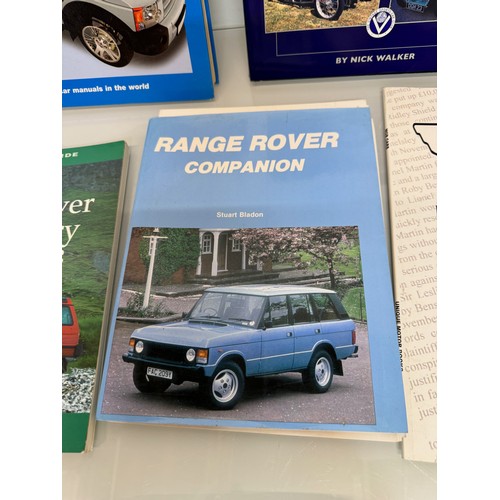 124 - Automobilia, books on Range Rovers and Land Rover Discovery and MG and more, a manual and a glass La... 