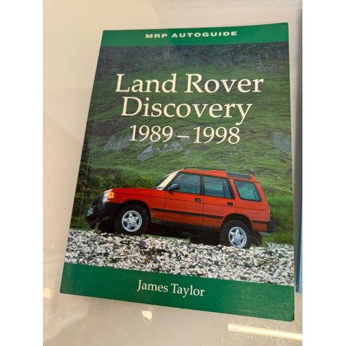 124 - Automobilia, books on Range Rovers and Land Rover Discovery and MG and more, a manual and a glass La... 