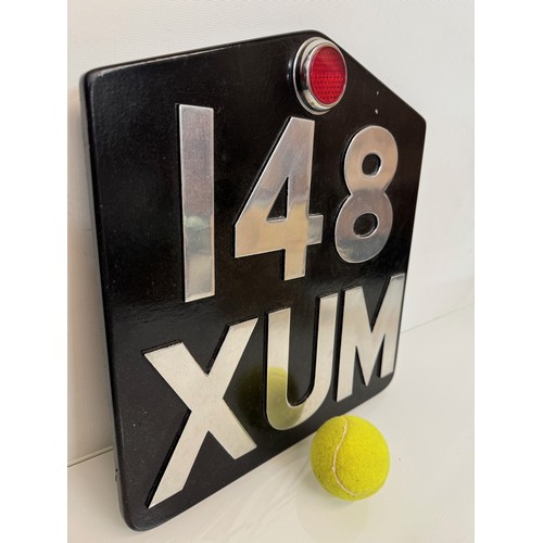 125 - Automobilia, a large over sized cast aluminium number plate.

This lot is available for in-house shi... 