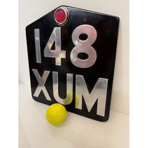 125 - Automobilia, a large over sized cast aluminium number plate.

This lot is available for in-house shi... 