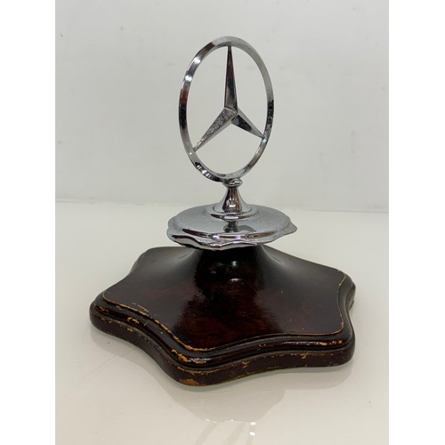 126 - Automobilia, a mounted grill mascot from a Mercedes motor car. 17 cm tall.

This lot is available fo... 