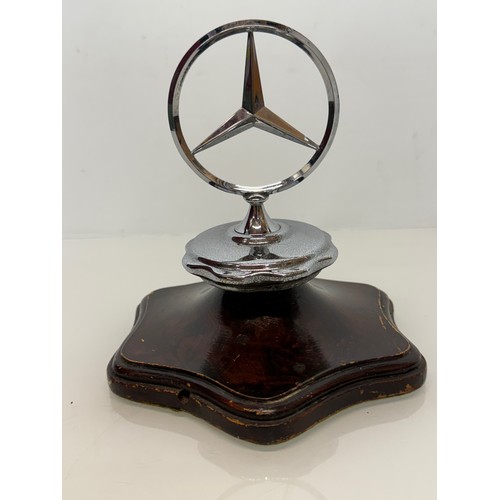 126 - Automobilia, a mounted grill mascot from a Mercedes motor car. 17 cm tall.

This lot is available fo... 