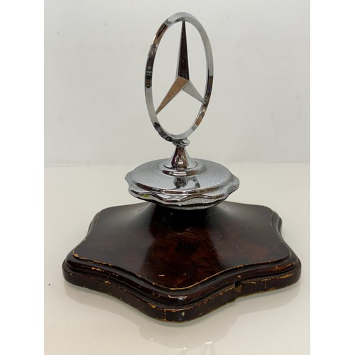 126 - Automobilia, a mounted grill mascot from a Mercedes motor car. 17 cm tall.

This lot is available fo... 