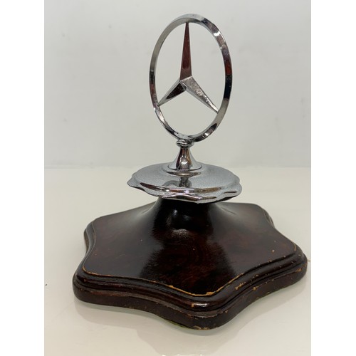 126 - Automobilia, a mounted grill mascot from a Mercedes motor car. 17 cm tall.

This lot is available fo... 