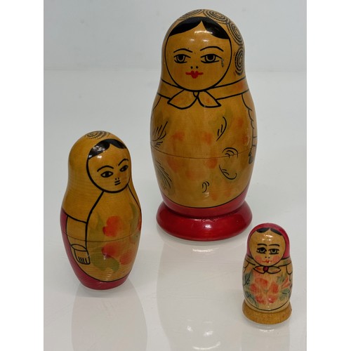 129 - Two wooden Russian Matryoshka stacking dolls.

This lot is available for in-house shipping