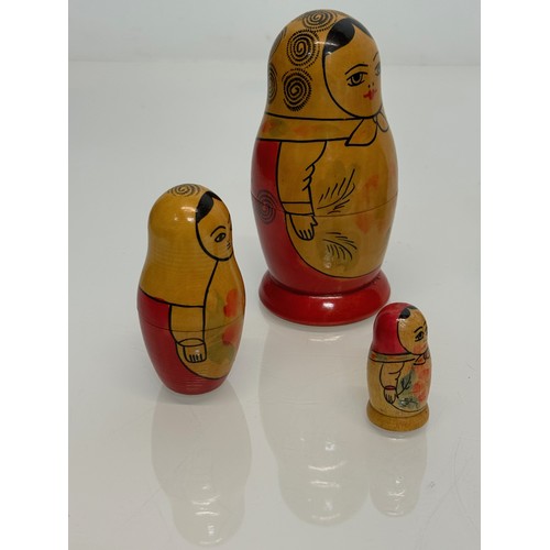 129 - Two wooden Russian Matryoshka stacking dolls.

This lot is available for in-house shipping