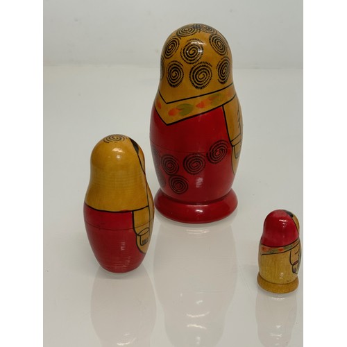 129 - Two wooden Russian Matryoshka stacking dolls.

This lot is available for in-house shipping