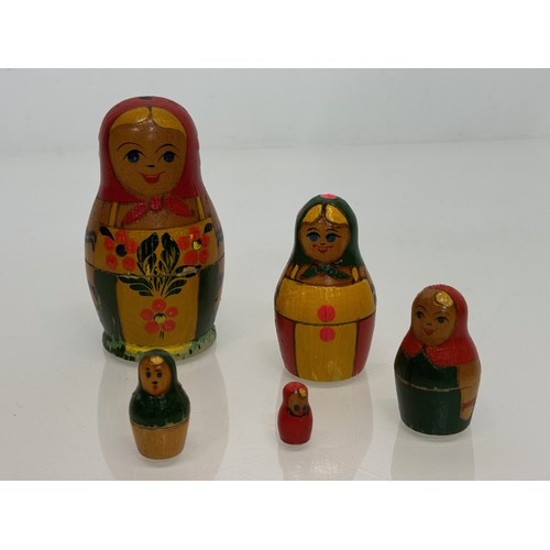 129 - Two wooden Russian Matryoshka stacking dolls.

This lot is available for in-house shipping