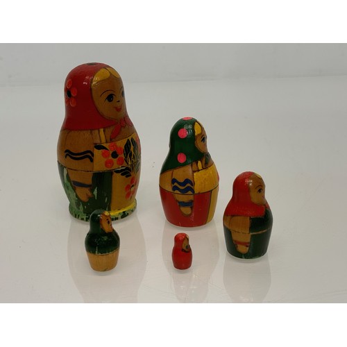 129 - Two wooden Russian Matryoshka stacking dolls.

This lot is available for in-house shipping