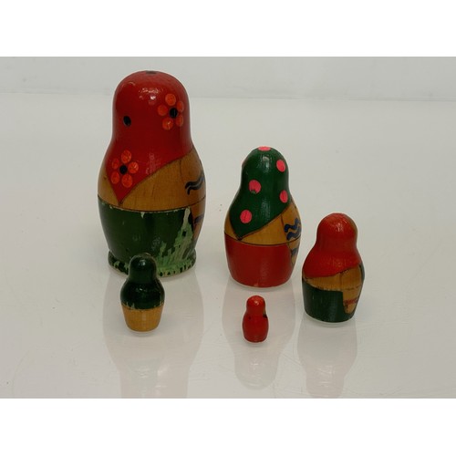 129 - Two wooden Russian Matryoshka stacking dolls.

This lot is available for in-house shipping