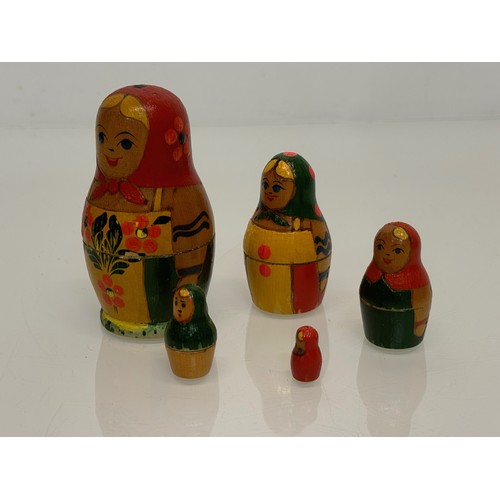 129 - Two wooden Russian Matryoshka stacking dolls.

This lot is available for in-house shipping