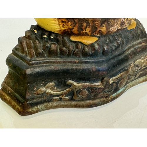 137 - An old cast iron door stop in the shape of a nesting duck. 17 cm wide x 20 cm tall.

This lot is ava... 