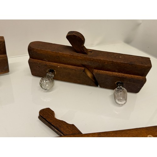 142 - Kitsch hanging rails, repurposed wooden block planes with glass hanging points, each individually mo... 