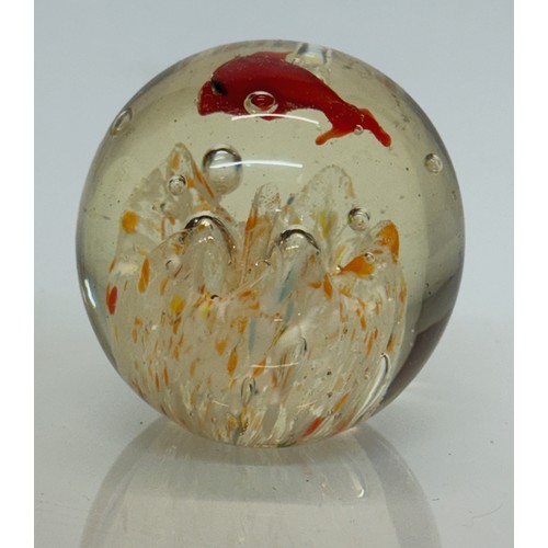 47 - Mid century art glass, a circulaur Murano glass paper weight with a tropical fish theme.  7 cm diame... 