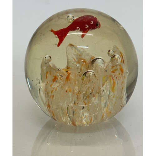 47 - Mid century art glass, a circulaur Murano glass paper weight with a tropical fish theme.  7 cm diame... 