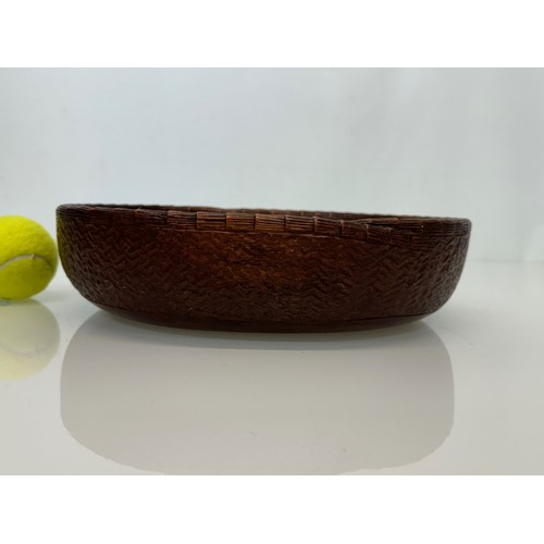 304 - Hand carved mid century wooden bowl of a yin and yang design, 31 cm x 25 cm x 7.5 cm.

This lot is a... 