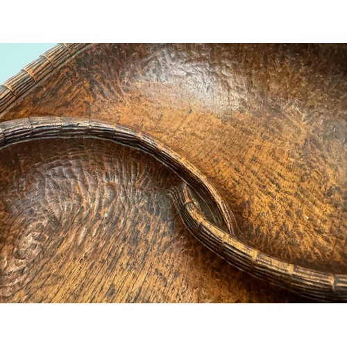 304 - Hand carved mid century wooden bowl of a yin and yang design, 31 cm x 25 cm x 7.5 cm.

This lot is a... 