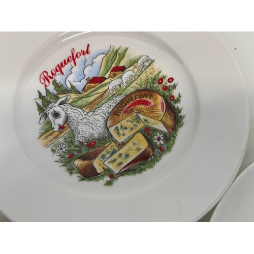 309 - AA set of kitsch mid century table wares, decorated plates with a theme for French regional cheeses.... 