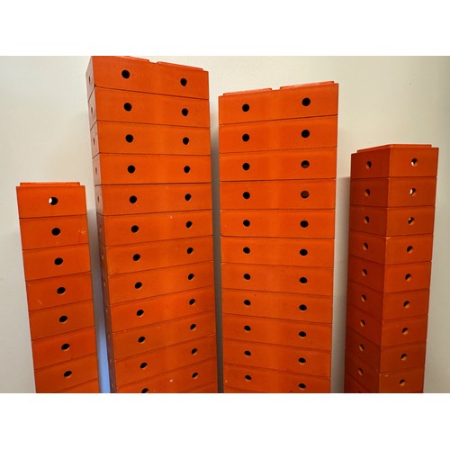 233 - Toys, German designer building blocks, good quantity of orange plastic large scale construction bric... 