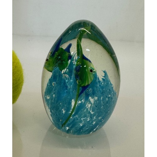 124 - Mid century art glass, an egg shaped Murano glass paperwight with tropical fish over a blue coral. 8... 