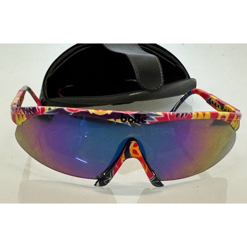 314 - Vintage ski wear, a cased pair of Bolle sunglasses, with alternative frame sections.

This lot is av... 