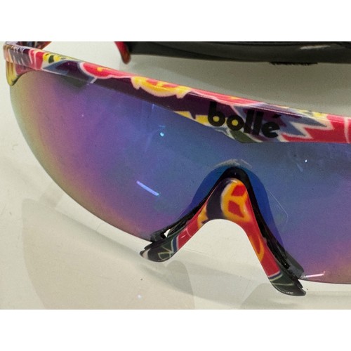 314 - Vintage ski wear, a cased pair of Bolle sunglasses, with alternative frame sections.

This lot is av... 