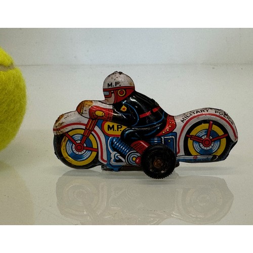 222 - Toys, lithographed tin plate toy Military Police Motorcyclist. 9 cm long.

This lot is available for... 