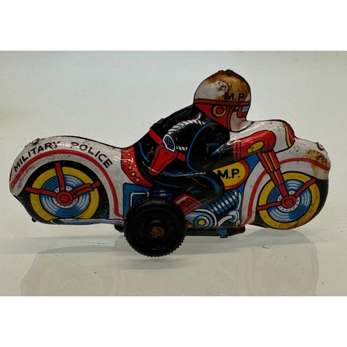 222 - Toys, lithographed tin plate toy Military Police Motorcyclist. 9 cm long.

This lot is available for... 