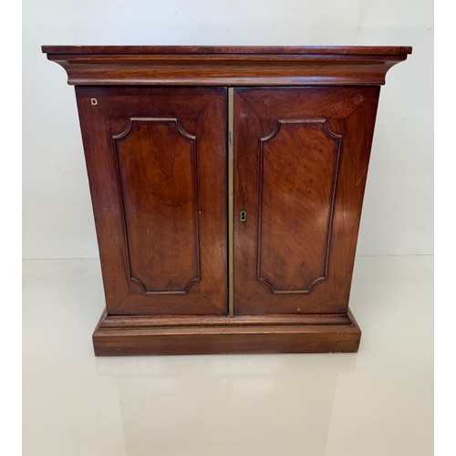 318 - Furniture, a mahogany collectors cabinet, the draws having multiple circular compartments within eac... 