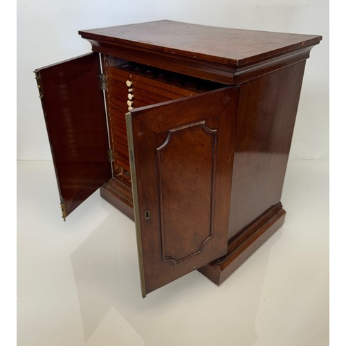 318 - Furniture, a mahogany collectors cabinet, the draws having multiple circular compartments within eac... 