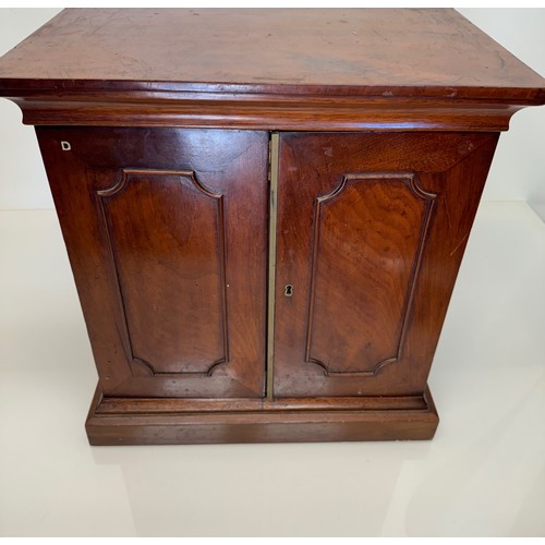 318 - Furniture, a mahogany collectors cabinet, the draws having multiple circular compartments within eac... 