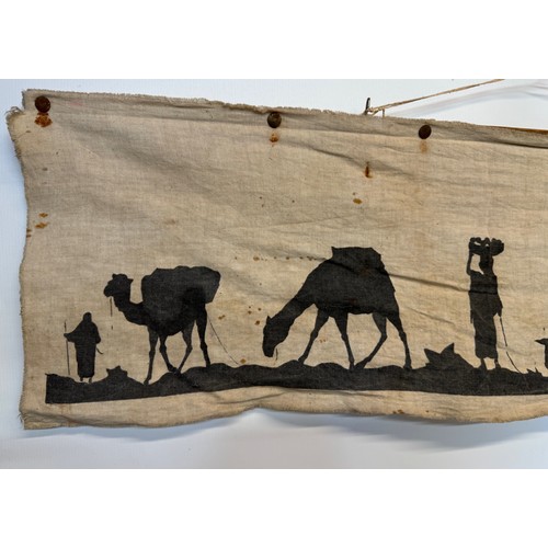 320 - Artwork, a Bedouin scene on linen, 109 cm x 27 cm.

This lot is available for in-house shipping