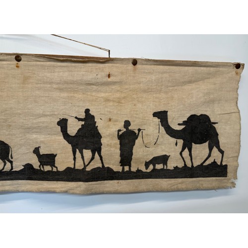 320 - Artwork, a Bedouin scene on linen, 109 cm x 27 cm.

This lot is available for in-house shipping