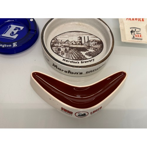 321 - Breweryana, beers, a collection of ceramic and plastic advertising ashtrays for a variety of breweri... 