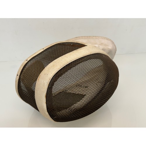 342 - Sporting equipment, a vintage Leon Paul fencing mask.

This lot is available for in-house shipping