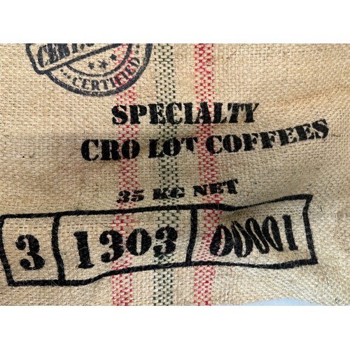 57 - Vintage hessian sack advertising The Green Collection Collumbian coffee, 73 cm x 63 cm.

This lot is... 