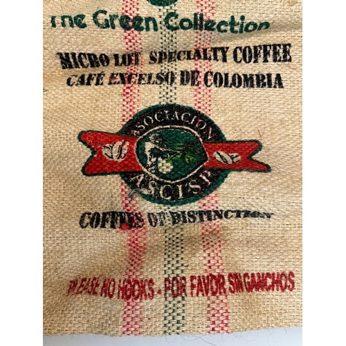 57 - Vintage hessian sack advertising The Green Collection Collumbian coffee, 73 cm x 63 cm.

This lot is... 