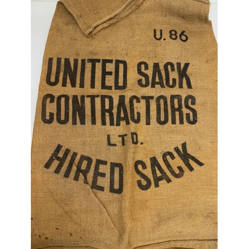 59 - Vintage hessian sack advertising United sack contractors a hired sack, 115 cm x 70 cm.

This lot is ... 