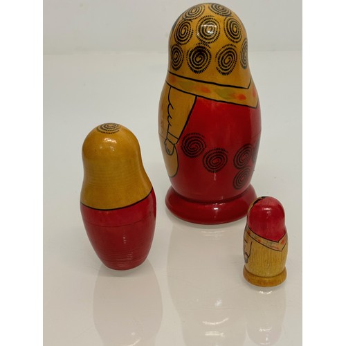 349 - Two wooden Russian Matryoshka stacking dolls.

This lot is available for in-house shipping