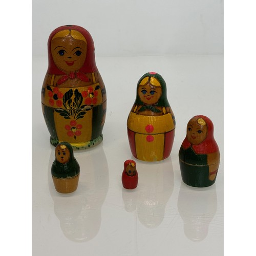 349 - Two wooden Russian Matryoshka stacking dolls.

This lot is available for in-house shipping