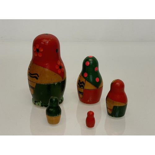 349 - Two wooden Russian Matryoshka stacking dolls.

This lot is available for in-house shipping