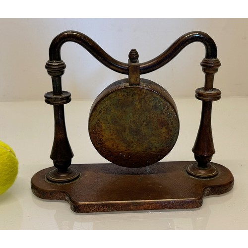 357 - Table gong, made from copper, very heavy, 24 cm wide x 18 cm tall.

This lot is available for in-hou... 