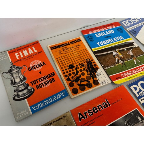 375 - Football programmes 1960’s - 70’s Man United, Liverpool, England Spurs etc. 22 in all.

This lot is ... 