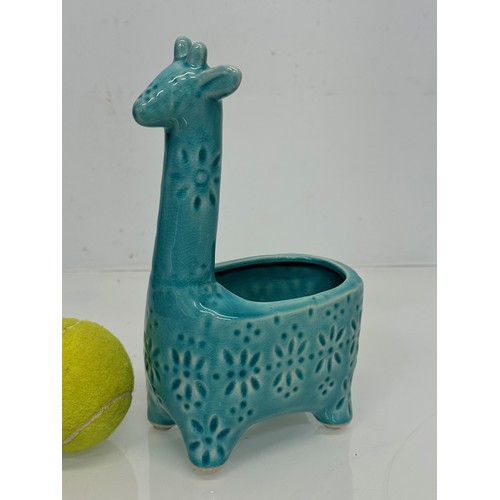 378 - Mid century studio pottery giraffe vase. 20 cm tall.

This lot is available for in-house shipping