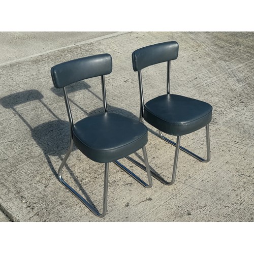 21 - Mid Century industrial furniture, a pair of upholstered chair with chrome plated frames.

This lot i... 