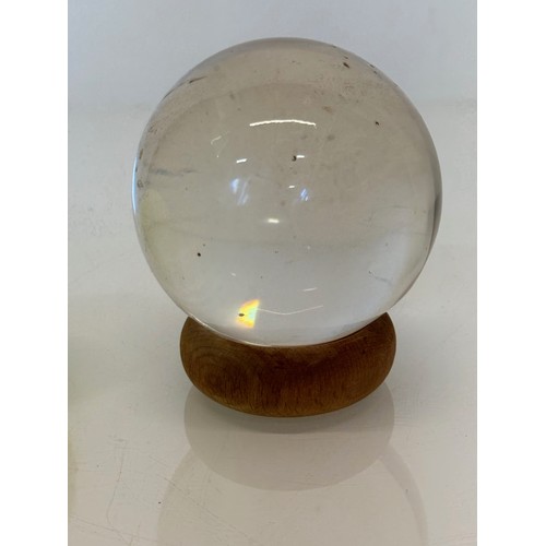 410 - Mystic Glass ball on stand.

This lot is available for in-house shipping