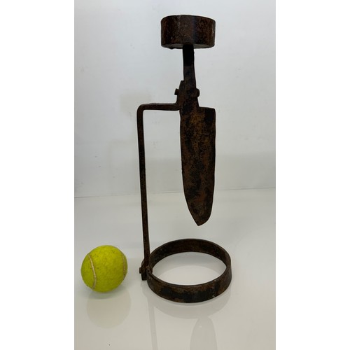 422 - Wrought iron art and crafts blacksmith made candle stand, 37 cm high.

This lot is available for in-... 