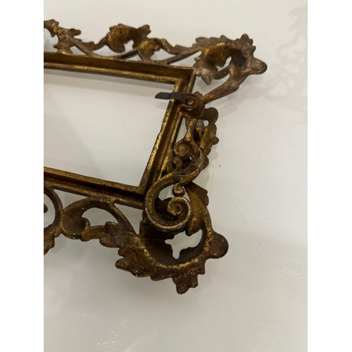 426 - Picture frames, two cast table top picture frames, 29 cm x 22 cm and 28 cm x 19 cm.

This lot is ava... 